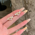 White Pearl Floral Cluster Mini Gold Tone Stud Earrings view 6
