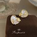 Gold Heart Stud Earrings White Shell Tulip CZ Accent view 3