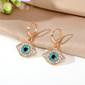 Gold Tone Crystal Evil Eye Necklace and Huggie Earring Options view 7