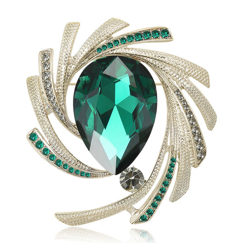 Green teardrop crystal swirl brooch front