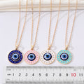 Gold Tone Round Crystal Evil Eye Pendant Necklaces in Four Colors view 3