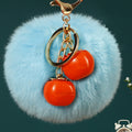 Twin Persimmon Plush Pom Keychains in Fifteen Listed Loop Colors view 4