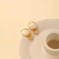 Gold Tone Hoop Double Heart Charm Small Huggie Earrings view 3