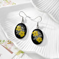 Black Oval Pressed Flower Drop Earrings in Nine Botanical Designs view 8