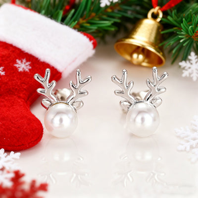 Image 1 showing pearl reindeer stud earrings