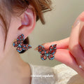 Red and Blue Crystal Butterfly Stud Earrings with Polished Metal Accents view 2