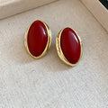 Gold Tone Oval Resin Stud Earrings in Ivory Black and Red view 2