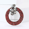 Crystal Wreath Brooch in Metal with Circular Crystal Rows Topped by a Floral Cluster view 2