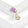 Winged Music Note Crystal Brooch in Blue and Purple view 3