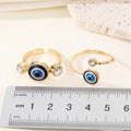 Gold Tone Blue Evil Eye and Crystal Adjustable Rings in Two Designs view 2