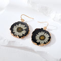 Gold Tone Irregular Pressed Daisy Resin Hook Earrings in Five Colors view 2