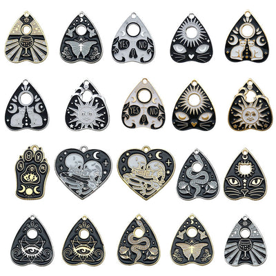 Colorful assorted shape charms arranged on a light background