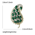 Crystal Paisley Leaf Brooch With Polished Metal And Sculpted Decorative Details view 6