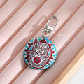 Silver Tone Round Printed Hamsa Eye Clip Keychains in Eight Designs view 4