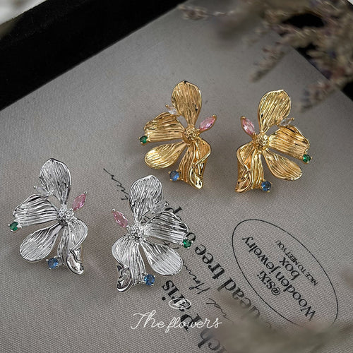 Silver and gold textured flower studs with multicolor CZ