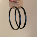 Slim Leather Hoop Earrings in Black and Brown with Polished Details view 8
