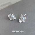 Silver Tone Ruffled Leaf And White Pearl Center Stud Earrings view 3