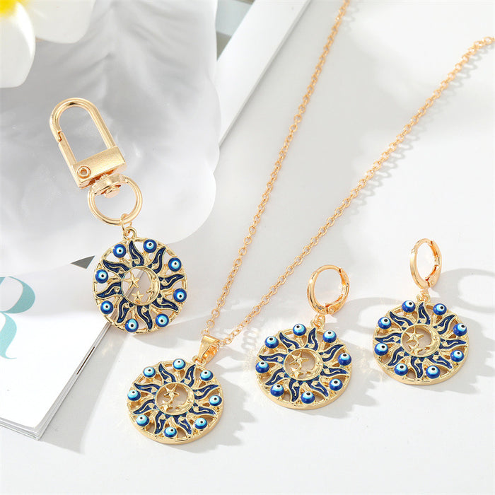 Gold Tone Sunburst Blue Evil Eye Jewelry and Keychain Options