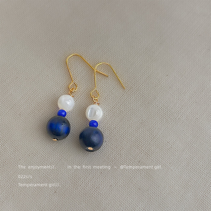 Gold Fishhook Earrings White Shell Dark Blue Stone Drops