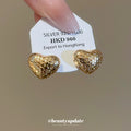 Textured Heart Stud Earrings With Polished Metal Tone Details view 2