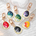 Gold Tone Oval Teardrop Marbled Swirl Clip Keychains in Six Colors view 1