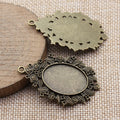 Antique Bronze Oval Cabochon Setting with Scrolled Edge view 2