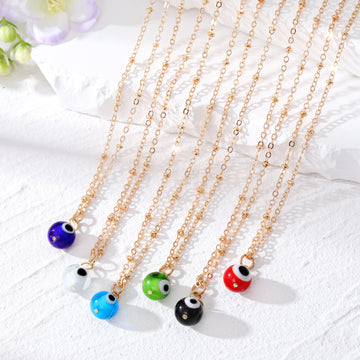 Gold and Silver Tone Round Glass Evil Eye Bead Pendant Necklaces