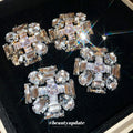 Geometric Clear Crystal Cluster Stud Earrings with Polished Metal Tone Details view 1