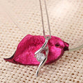 Silver Tone Curved Leaf Pendant Necklace With Clear Stone view 3