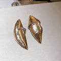 Sculptural Metal Lip Stud Earrings In Gold And Silver view 6
