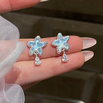 Blue Star Crystal Drop Stud Earrings with Reflective Details