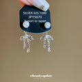 Pearl Bow Drop Earrings with Silver Tone Chain Tassels view 4