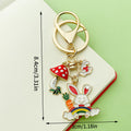 Easter Bunny Charm Keychains Featuring Pink Blossom Across 19 Pictured Variations view 3