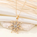 Gold Tone Crystal Snowflake Sunburst Pendant Necklace view 4