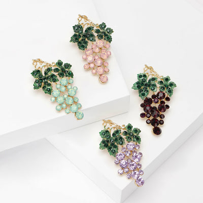 Front view of crystal grape cluster brooch in four pastel colorways