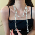 Long Pearl Strand And Crystal Bow Silver Tassel Necklace view 1