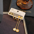 Gold Tone Three Pair Disc Stud Hoop and Long Crystal Drop Earring Set view 1