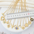 Gold Tone Vintage Motif Pendant Necklaces in Twelve Eye and Symbol Designs view 5