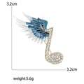 Winged Music Note Crystal Brooch in Blue and Purple view 5