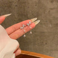 Silver Bow and Teardrop Chain Stud Earrings Statement Jewelry view 1