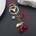 Twelve Resin Cherry Strawberry and Peach Metal Keychain Designs view 6