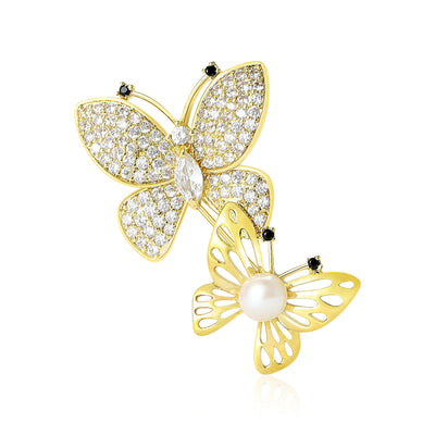 Front product view of the pair of gold-tone butterflies combining clear crystals and a pearl accent brooch