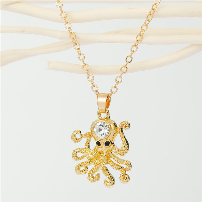 Gold Tone Crystal Octopus Pendant Necklace with Textured Tentacles