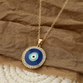 Gold Tone Crystal Halo Blue Evil Eye Pendant Necklace view 4