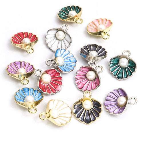 Color and design selection of fan shells with a single white pearl-like center accent