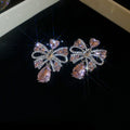 Silver Tone Crystal Bow Stud Earrings With Pink Teardrop Accents view 6