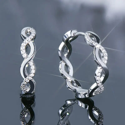 Front product view of the Silver Tone and Gold Tone earring design showing interlaced wavy hoops with alternating polish