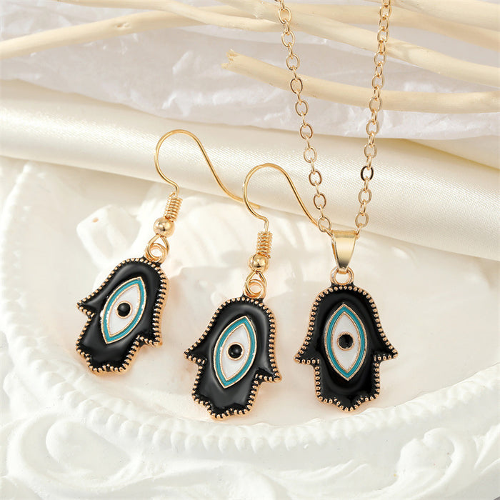 Gold Tone Black Enamel Hamsa Eye Necklace and Hook Earrings