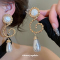 Gold Tone Spiral And Pearl Teardrop Stud Earrings With Crystals view 1