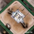 Silver Tone Asscher Cut CZ Ring With Round Side Stones view 5